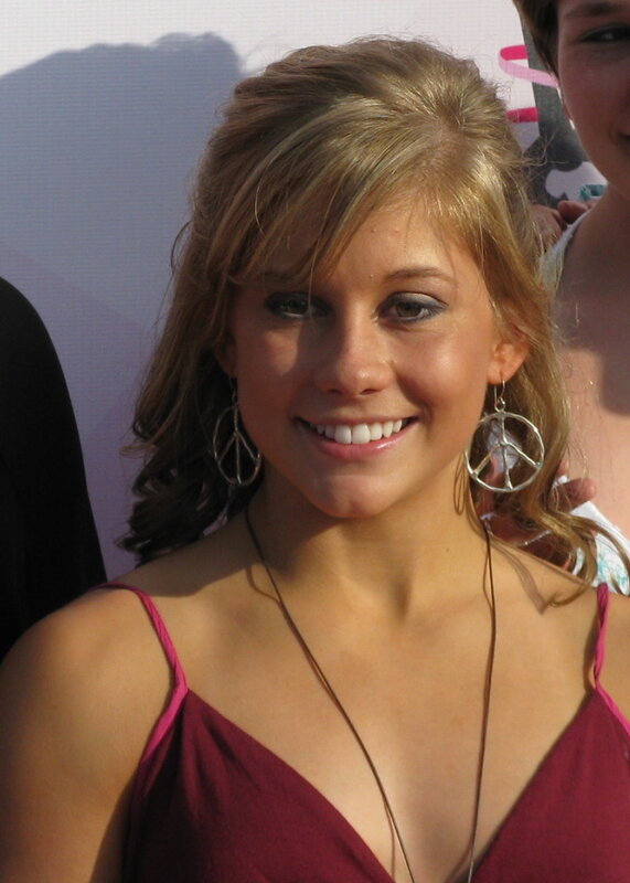 woman in red dress smiling