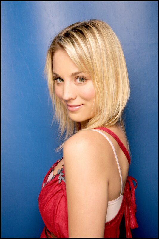woman in red dress smiling
