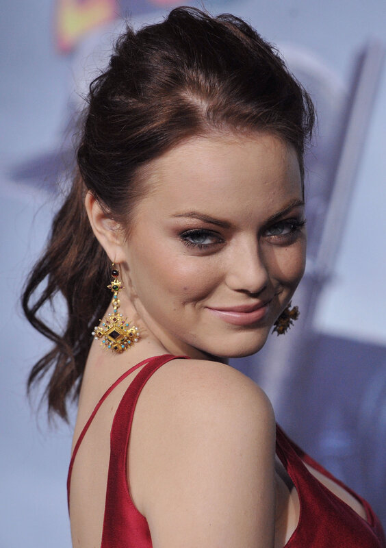 woman in red dress smiling