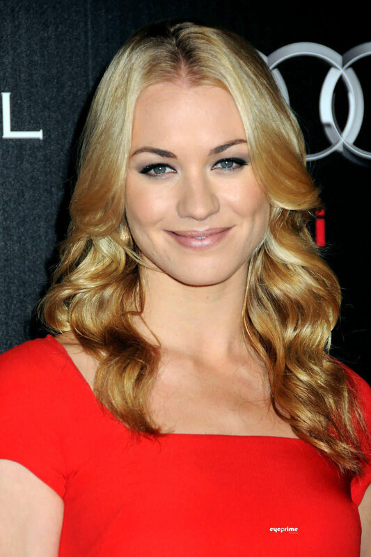 woman in red dress smiling