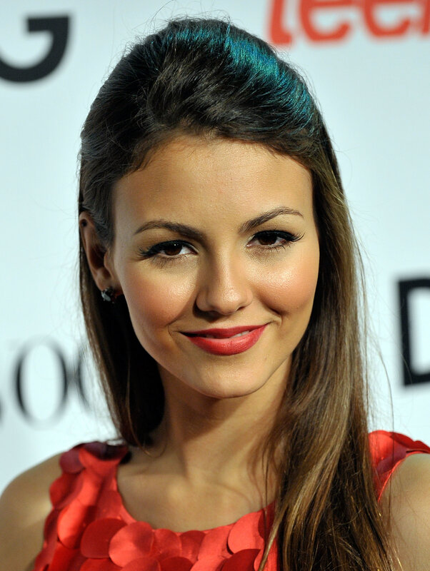 woman in red dress smiling