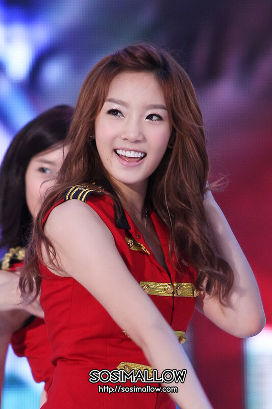 woman in red dress smiling