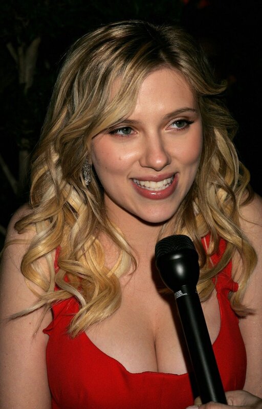 woman in red dress speaking