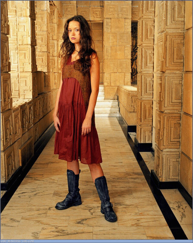 woman in red dress standing