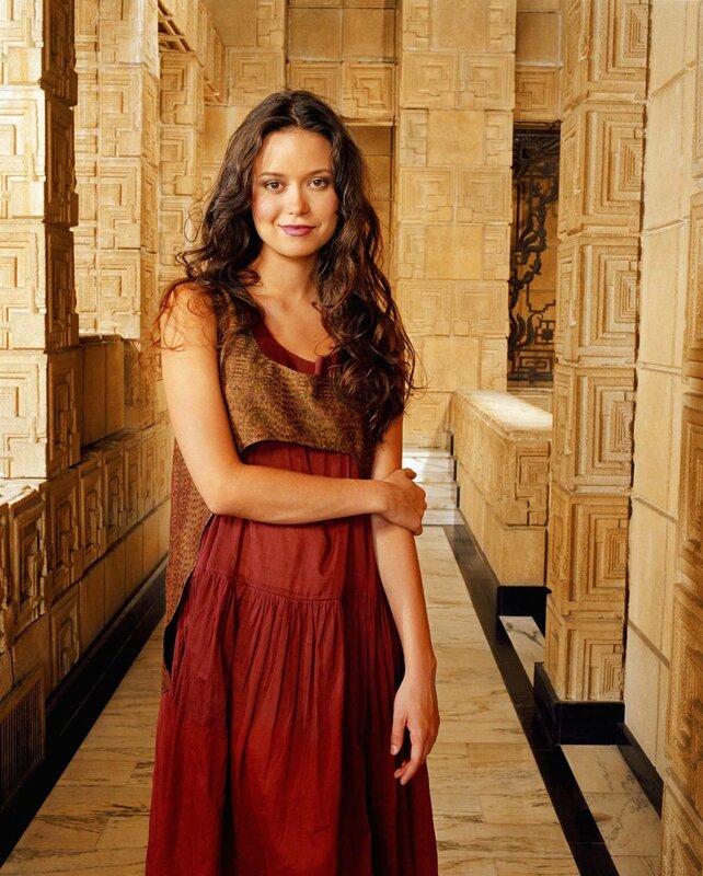 woman in red dress standing