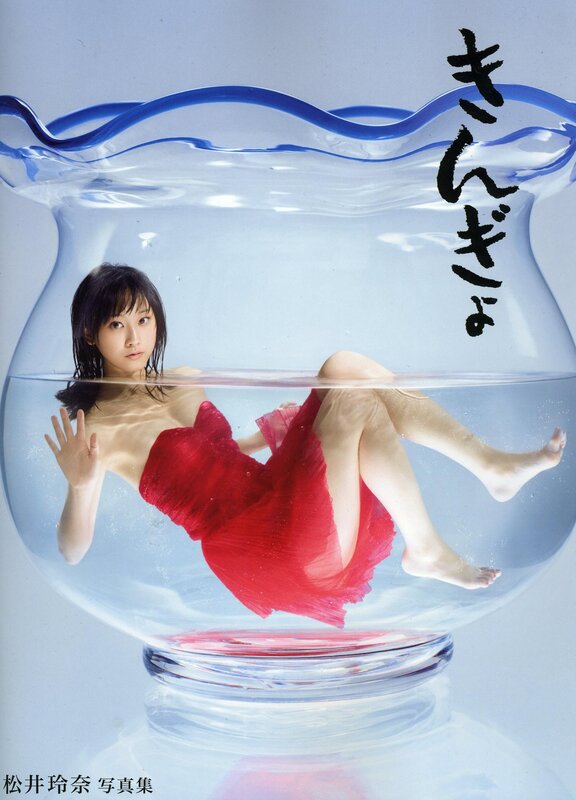 woman in red dress underwater