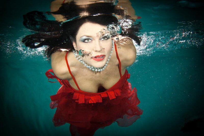 Woman in Red Dress Underwater — Dramatic, Photograph