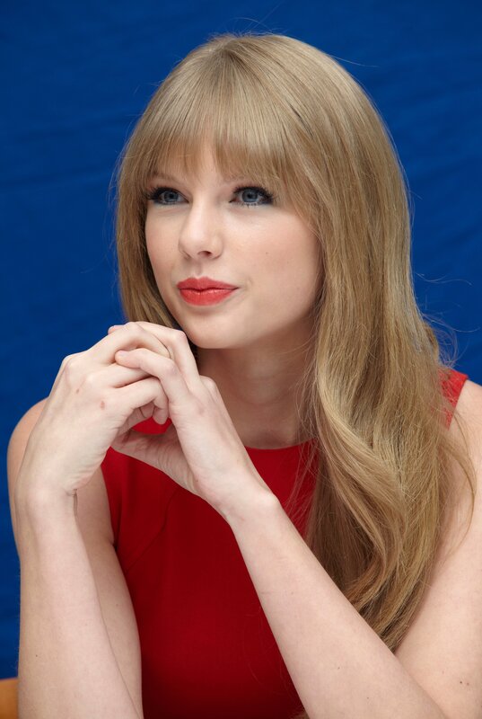woman in red dress with blonde hair