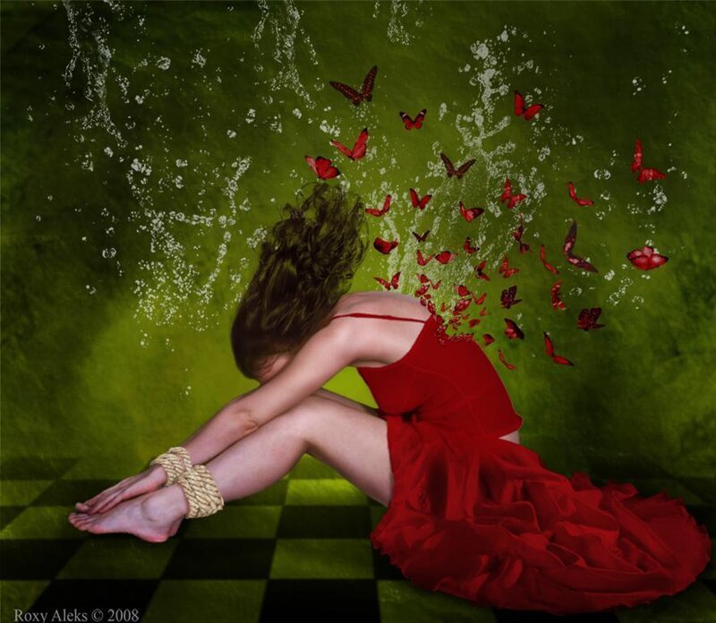 Woman in red dress with butterflies