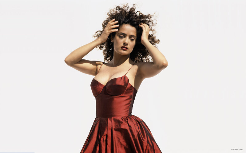 woman in red dress with curly hair