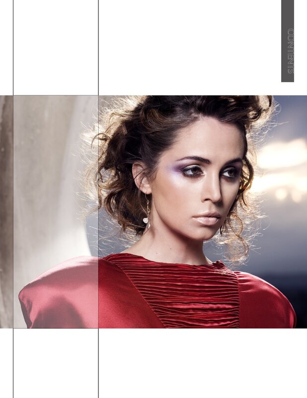 woman in red dress with dramatic makeup