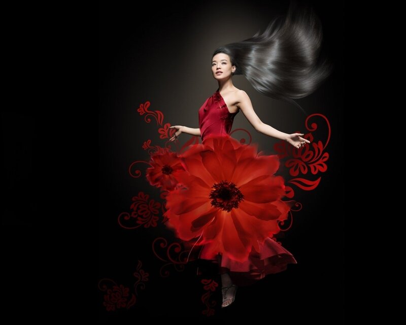 woman in red dress with floral design