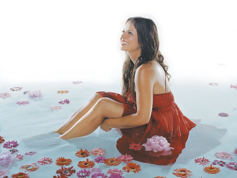 Woman in red dress with flowers