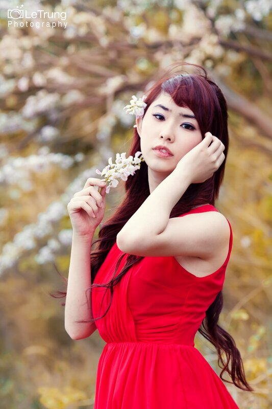 woman in red dress with flowers