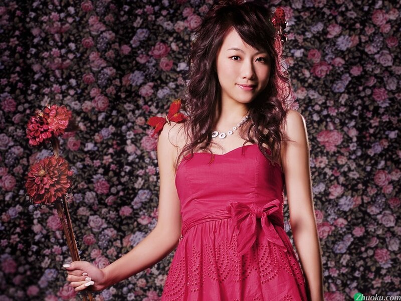 Woman in red dress with flowers