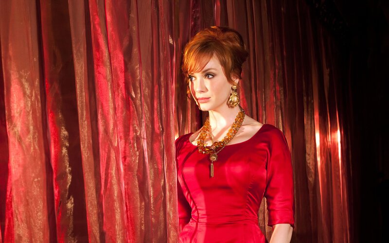 woman in red dress with jewelry