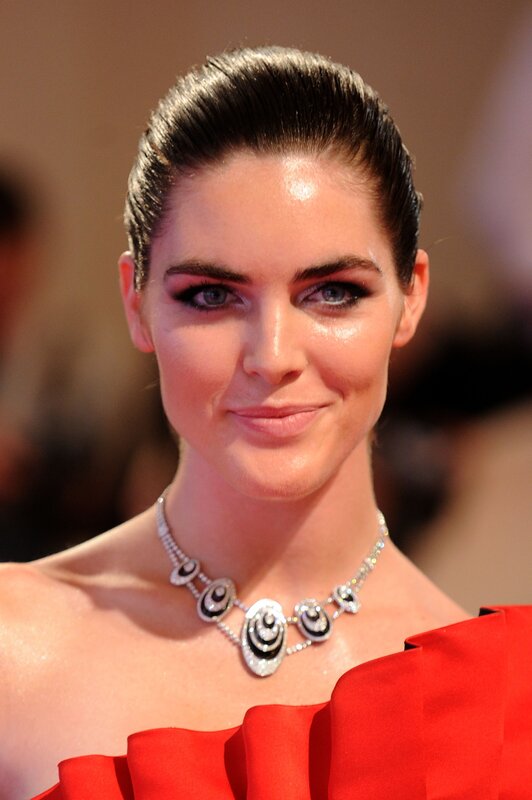 woman in red dress with necklace