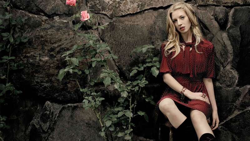 woman in red dress with roses