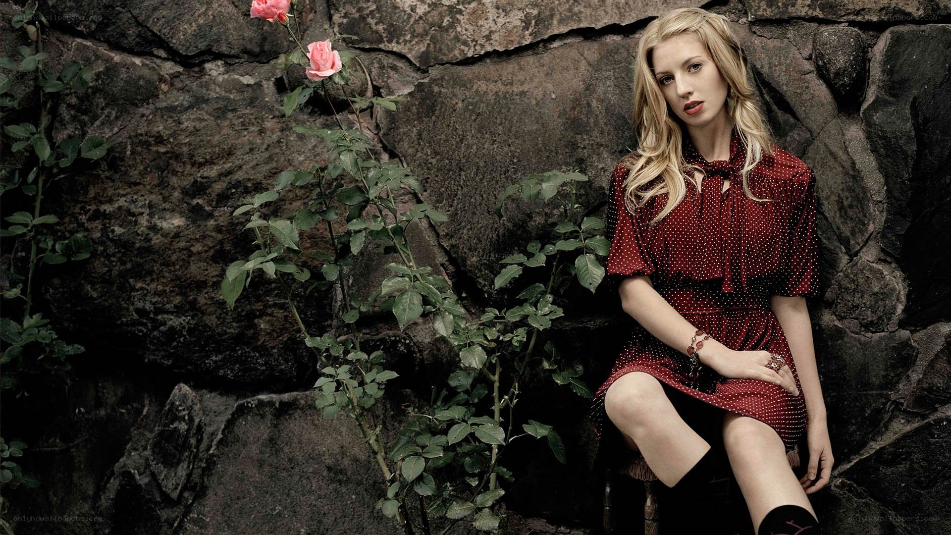 woman in red dress with roses