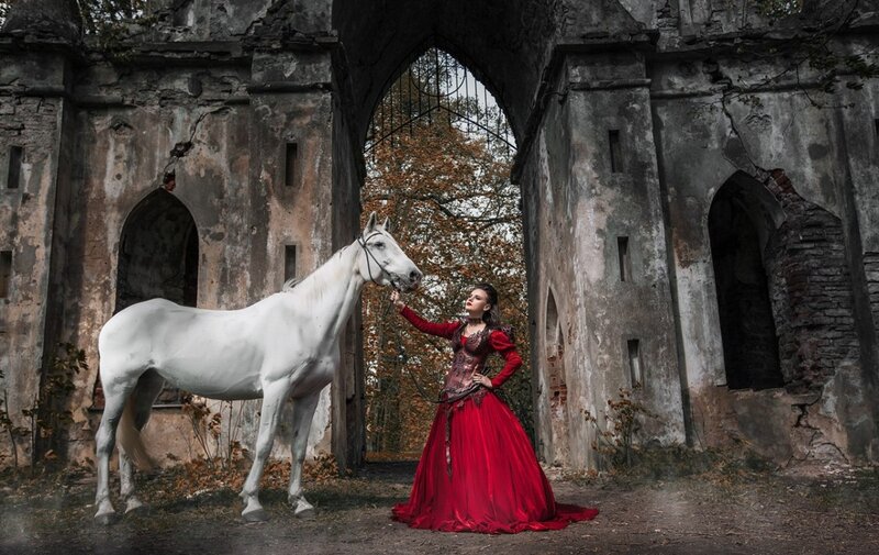 Woman in Red Dress with White Horse