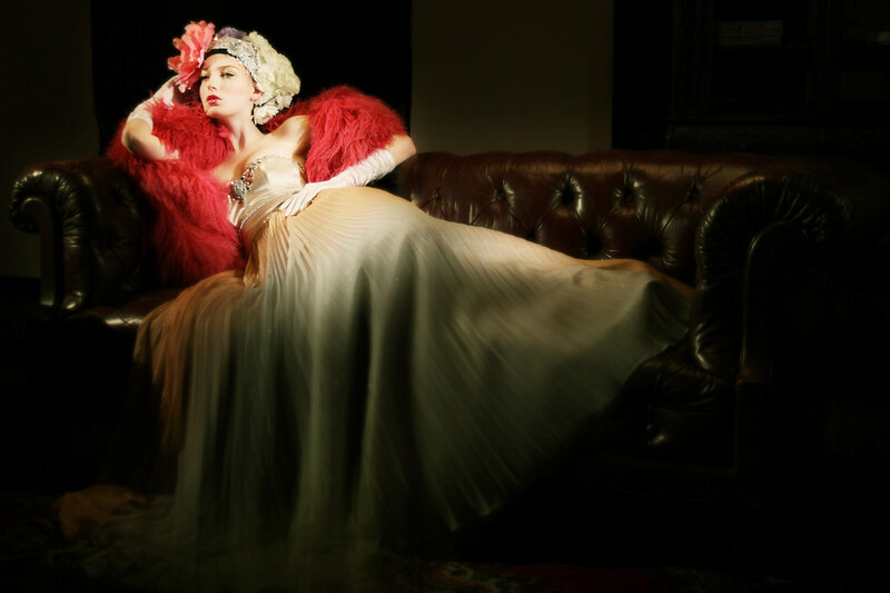 Woman in Red Feather Boa — Dramatic