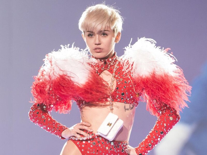 Woman in Red Feather Costume — Dramatic