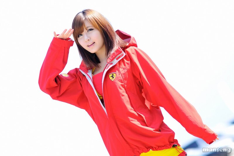woman in red ferrari jacket