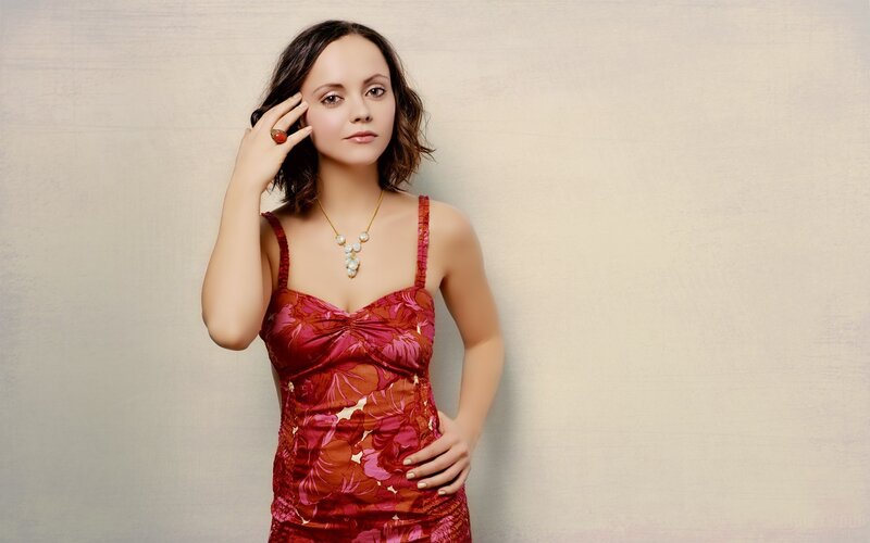 woman in red floral dress