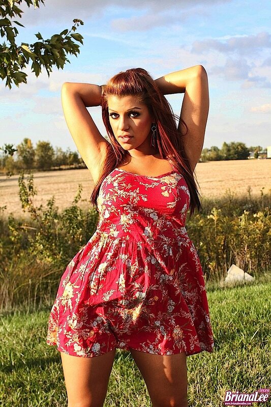 Woman in red floral dress