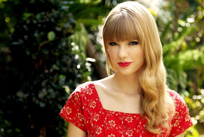woman in red floral dress