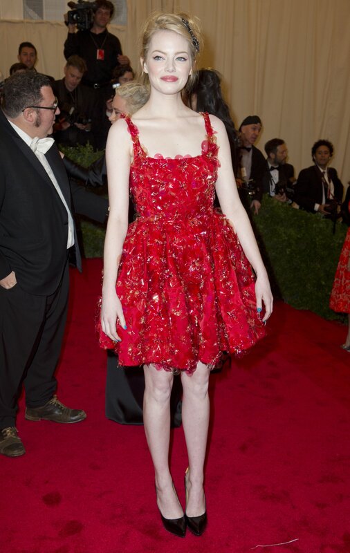 Woman in red floral dress