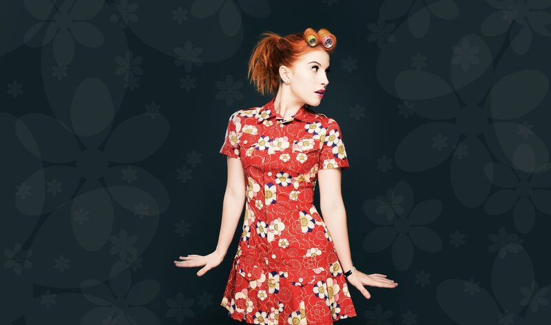 woman in red floral dress