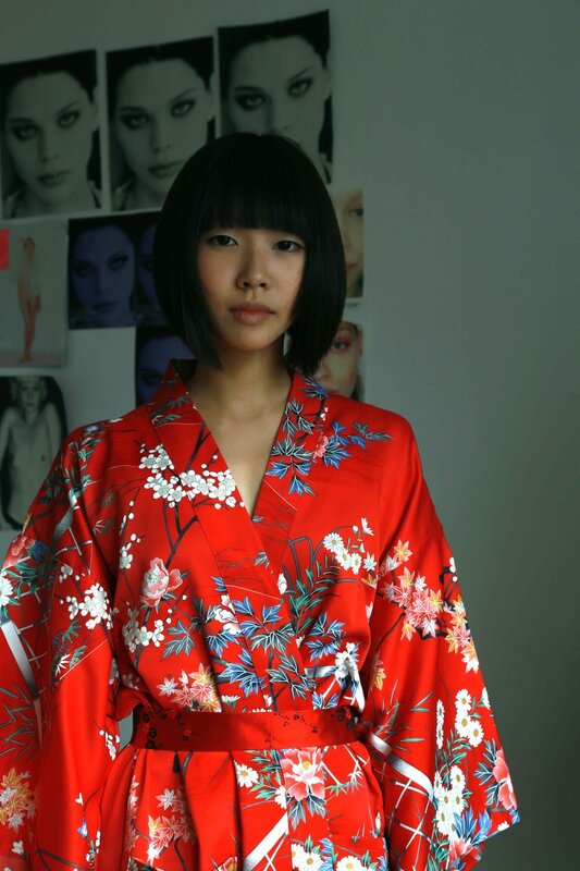 woman in red floral kimono