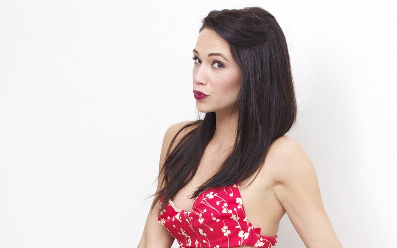 woman in red floral top