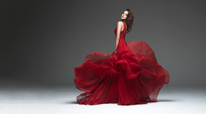 woman in red flowing gown