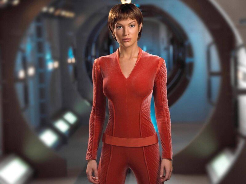 woman in red futuristic suit
