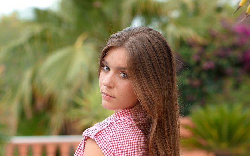 woman in red gingham shirt