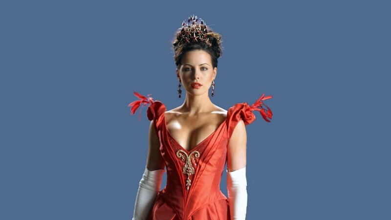 woman in red gown and crown