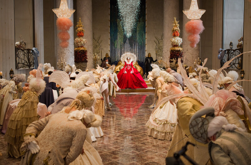 Woman in Red Gown — Dramatic, Photograph, Crowd