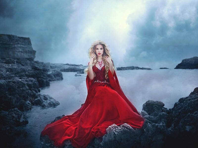Woman in Red Gown — Dramatic, Photograph, Rocks
