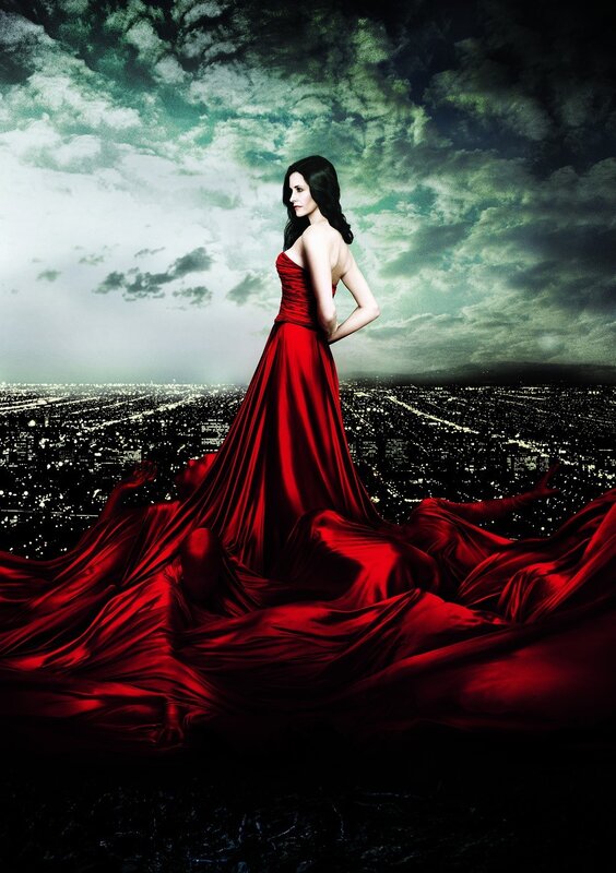 woman in red gown on cityscape