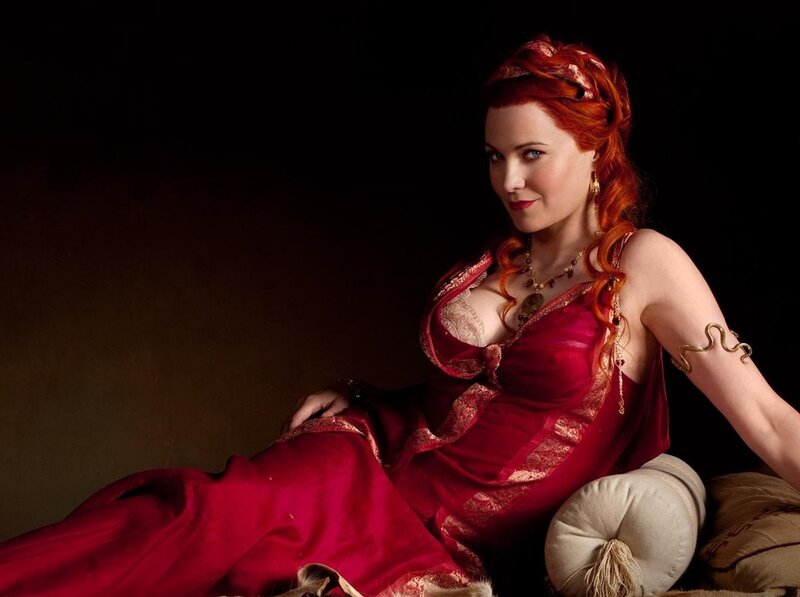 Woman in red gown with red hair