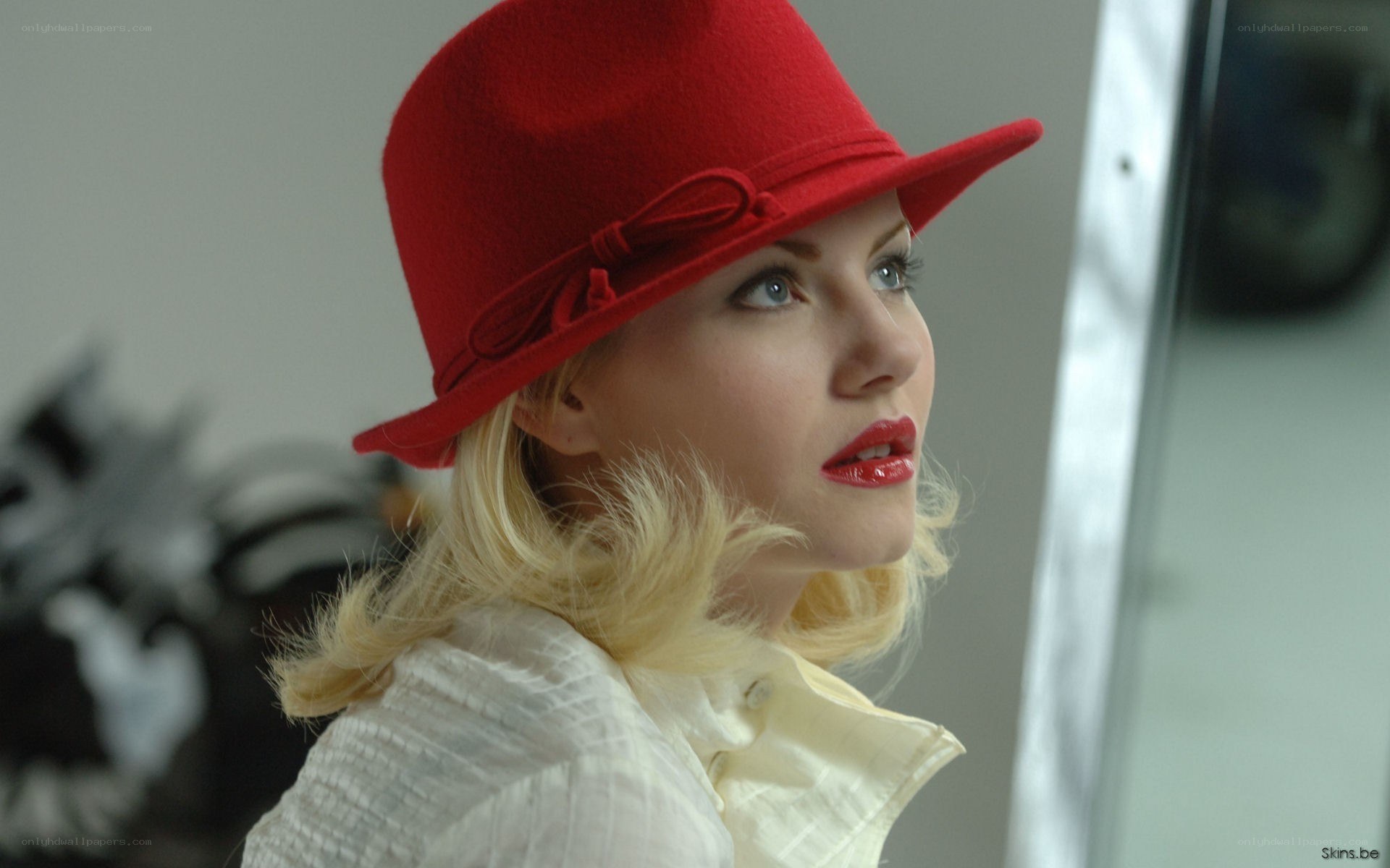 woman in red hat