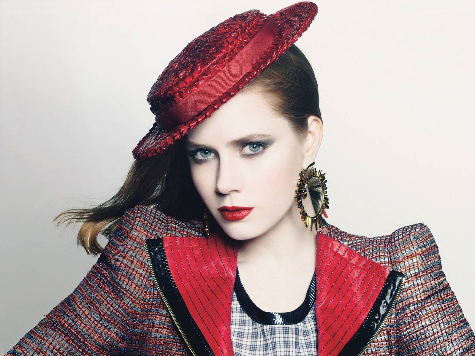 woman in red hat and jacket