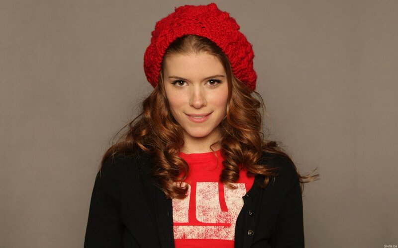 woman in red hat and shirt