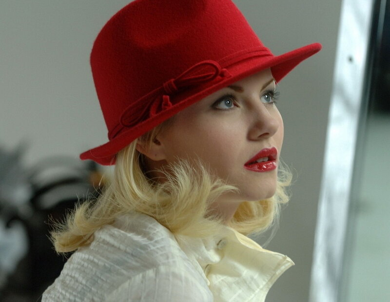 Woman in Red Hat — Contemplative