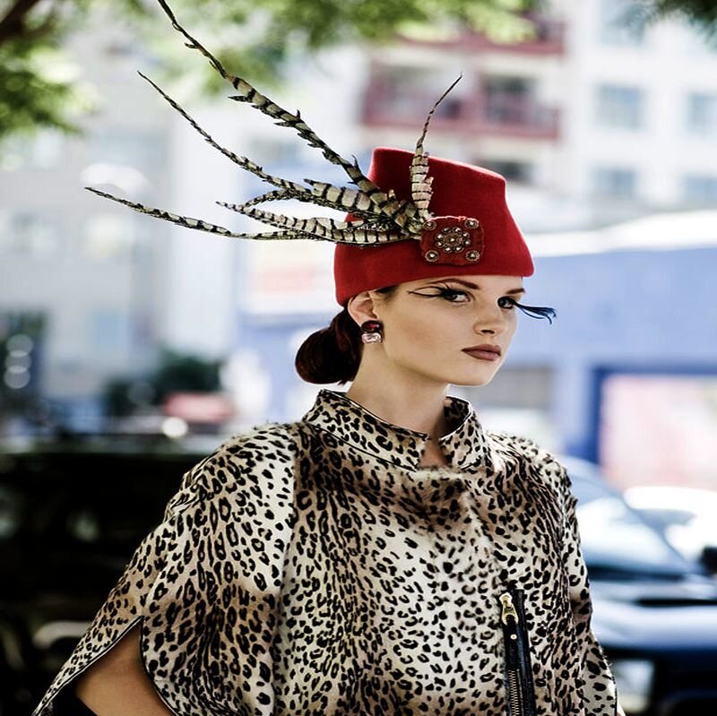 Woman in Red Hat — Dramatic, Daytime