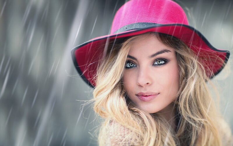 Woman in Red Hat — Dramatic, Photograph, Rain