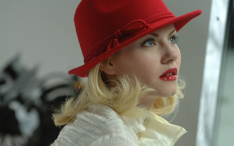 Woman in Red Hat — Dramatic, Photograph
