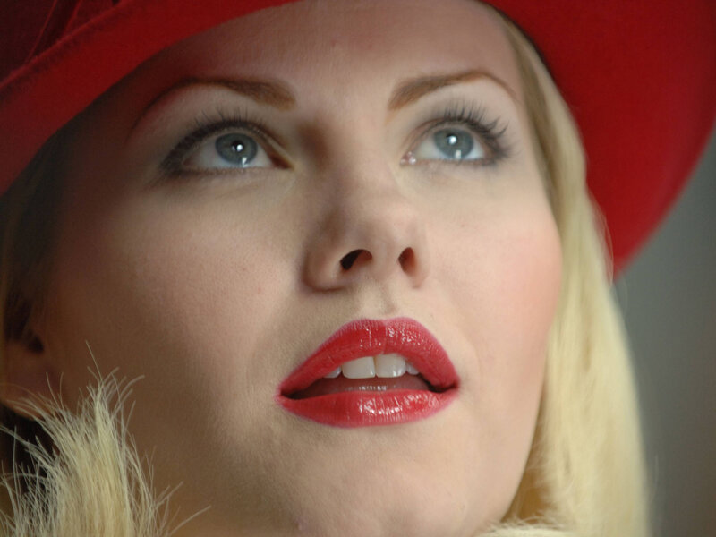 Woman in Red Hat — Dramatic